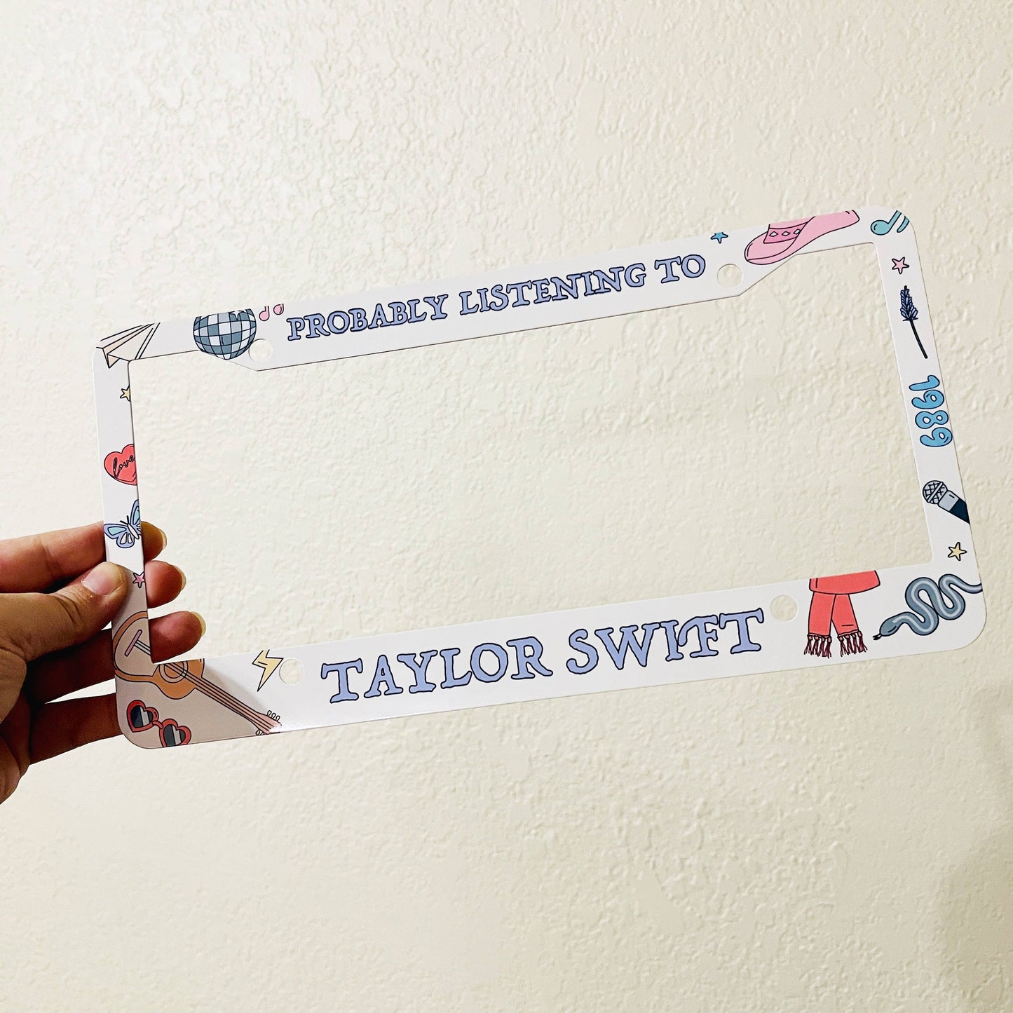 Probably Listening To Taylor Swift | License Plate Frame